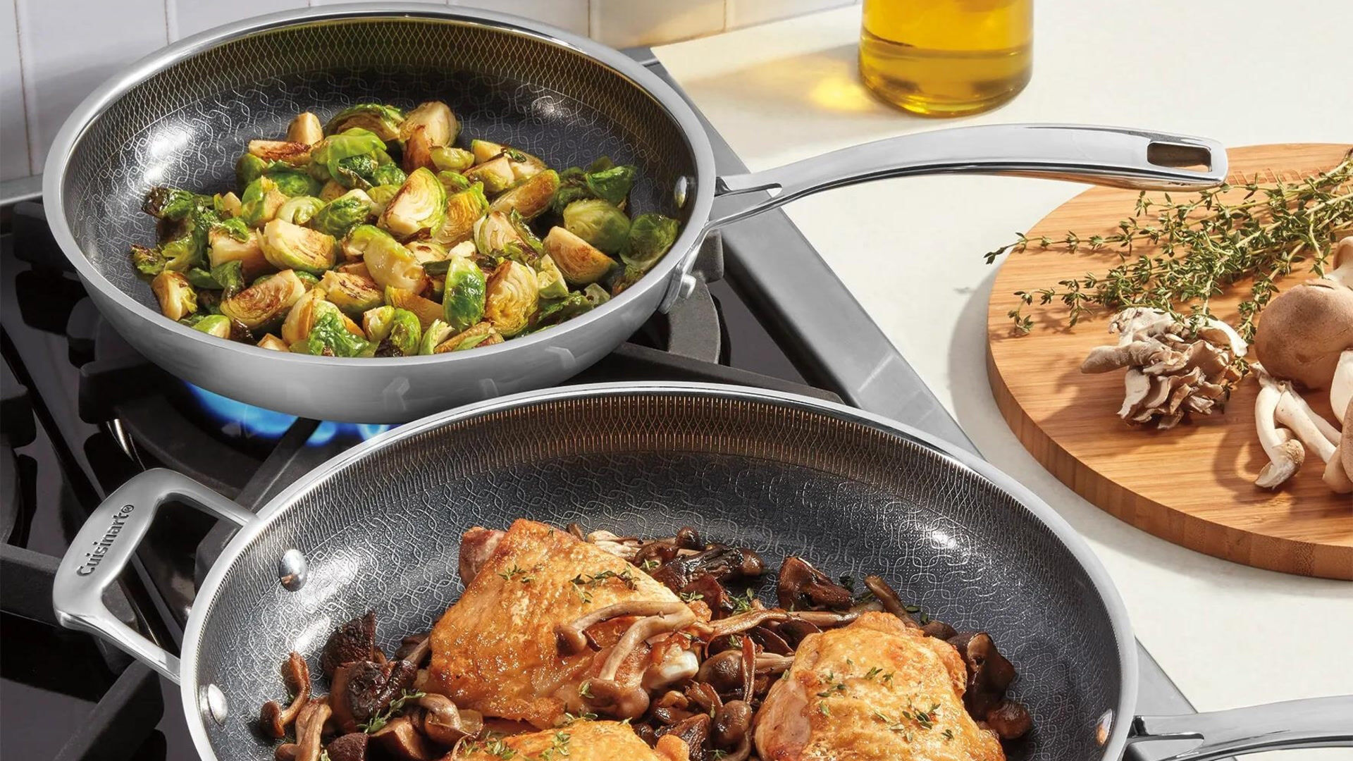 Fusion Plus Pans on Stove with brussels sprouts in one pan and chicken in the other pan